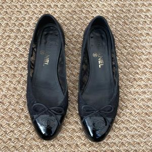 Chanel black lace ballerina flats.